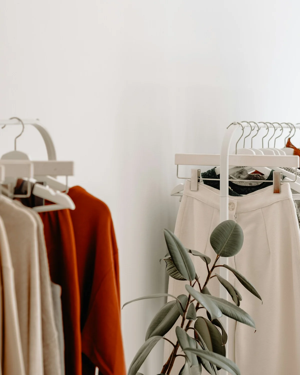 Fashion garments in a bright contemporary retail space